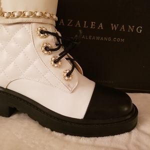 White and black combat boots